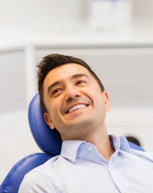 Patient speaking with dental team member