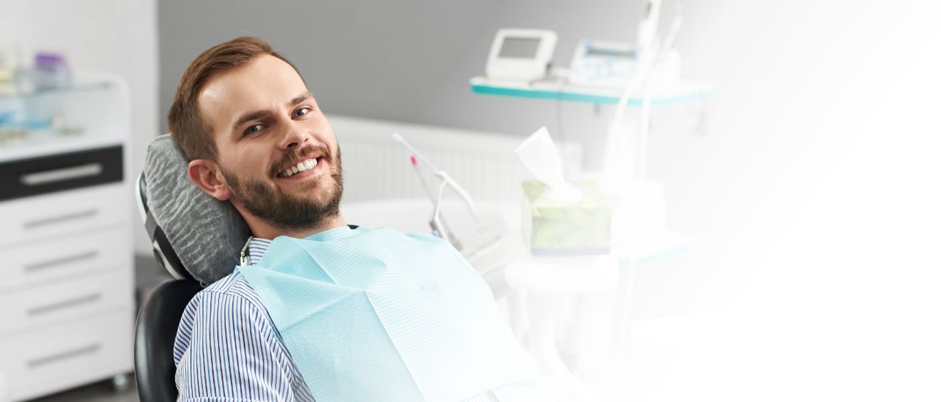 Man leaning back in dental chair