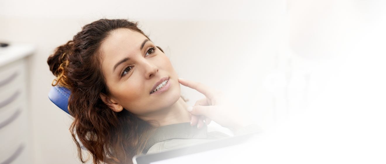 Woman leaning back in dental chair