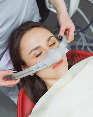 A woman receiving sedation dentistry