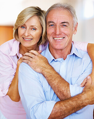 Man and woman with all on four dental implants