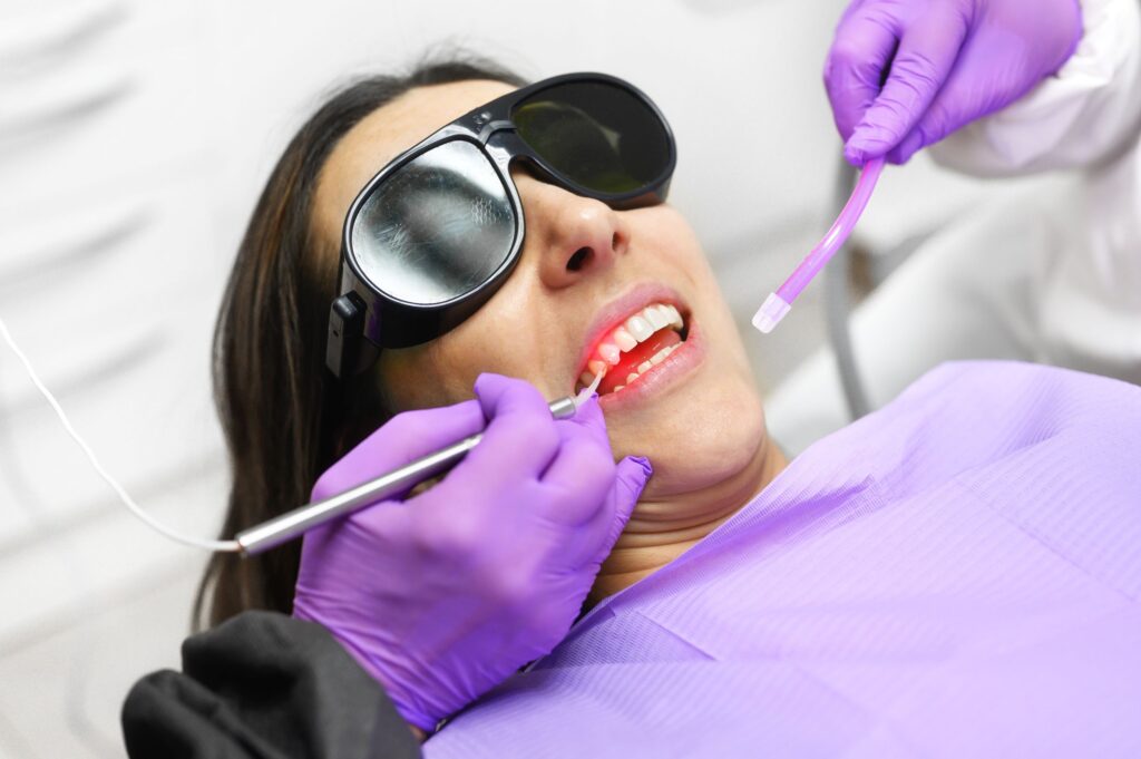 Woman undergoing LANAP gum disease treatment